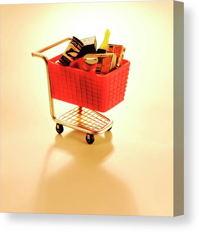 Brand Canvas Print featuring the drawing Red Full Shopping Cart by CSA Images