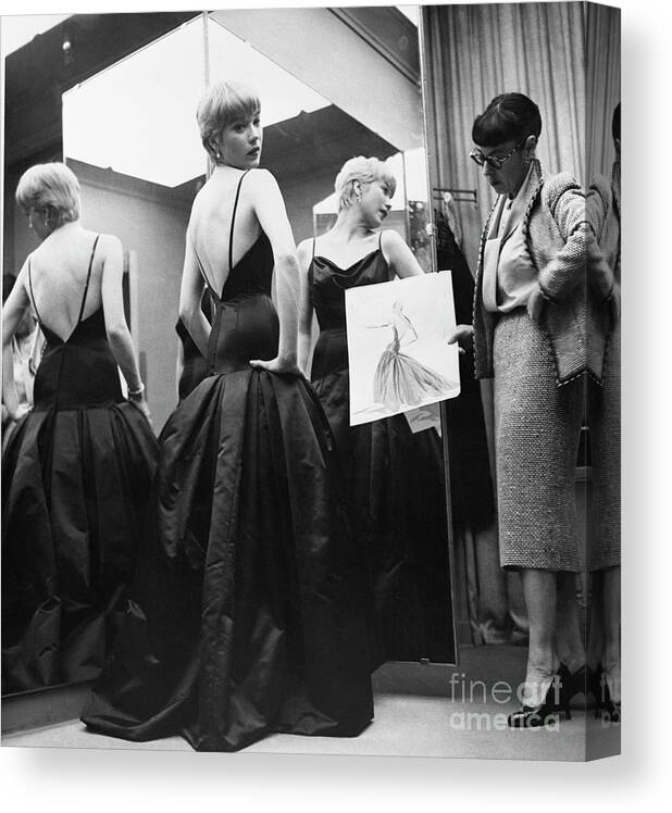 People Canvas Print featuring the photograph Shirley Maclaine Trying On Gown by Bettmann