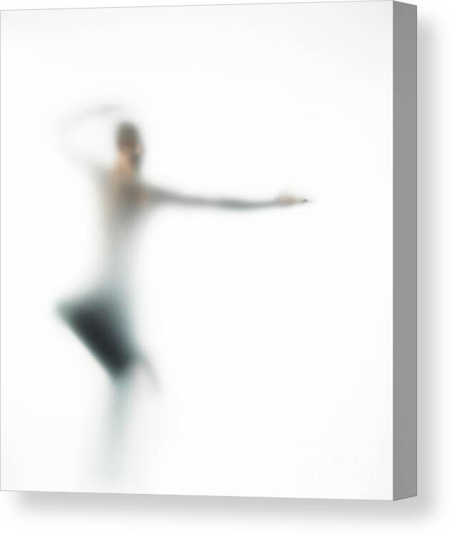 Human Arm Canvas Print featuring the photograph Young Man Practicing Martial Arts by Symphonie
