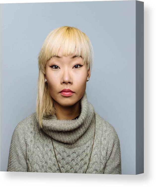Asian And Indian Ethnicities Canvas Print featuring the photograph Portrait of Asian woman with blonde hair #3 by Ian Ross Pettigrew