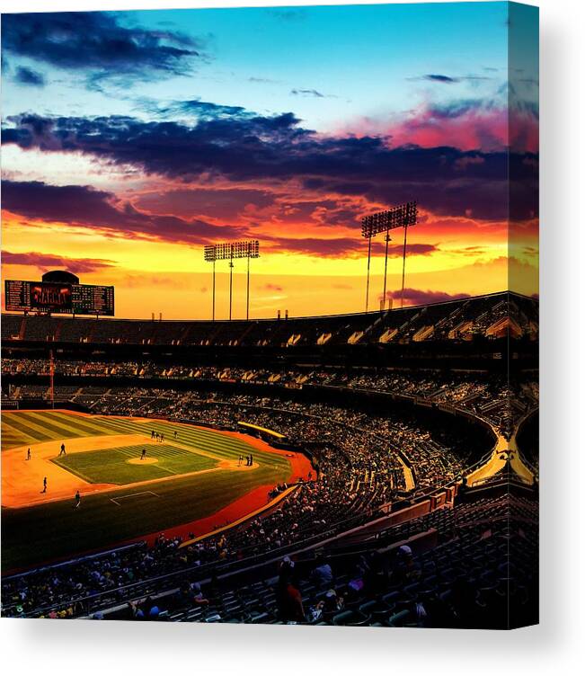 Oakland Canvas Print featuring the digital art The Oakland-Alameda County Coliseum in sunset light by Nicko Prints