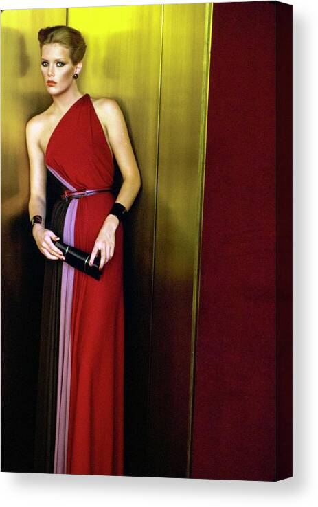 Fashion Canvas Print featuring the photograph Patti Hansen Wearing A Galanos Dress #1 by Arthur Elgort