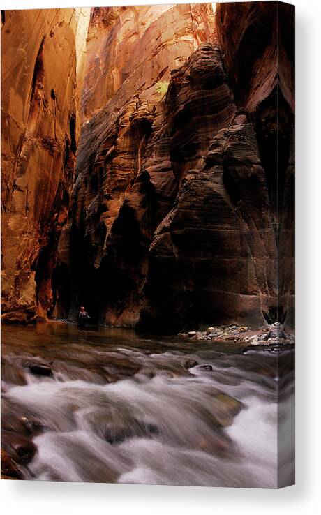 Adventure Canvas Print featuring the photograph A Woman Hikes Through A River Bed #20 by Rich Wheater