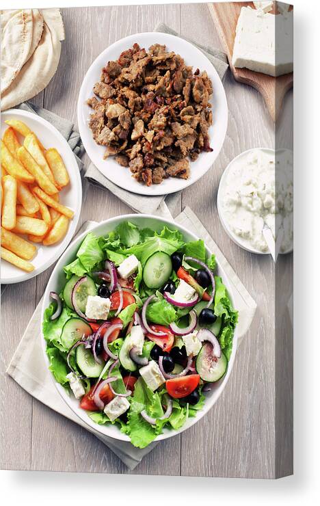 Feta Cheese Canvas Print featuring the photograph Greek Salad With Gyros And Fries by Svariophoto