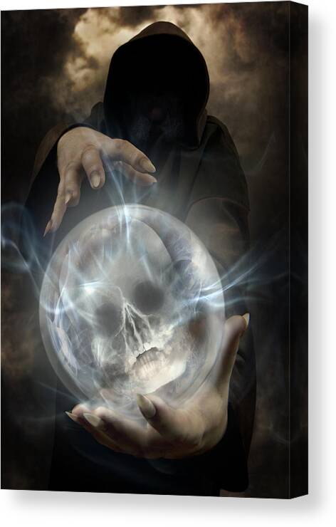 Hooded Canvas Print featuring the photograph Hooded man wearing dark cloak holding glowing crystall ball with human skull image inside by Jaroslaw Blaminsky