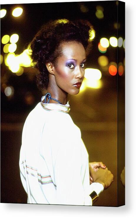 Accessories Canvas Print featuring the photograph Iman Wearing A Silk Shirt by Arthur Elgort