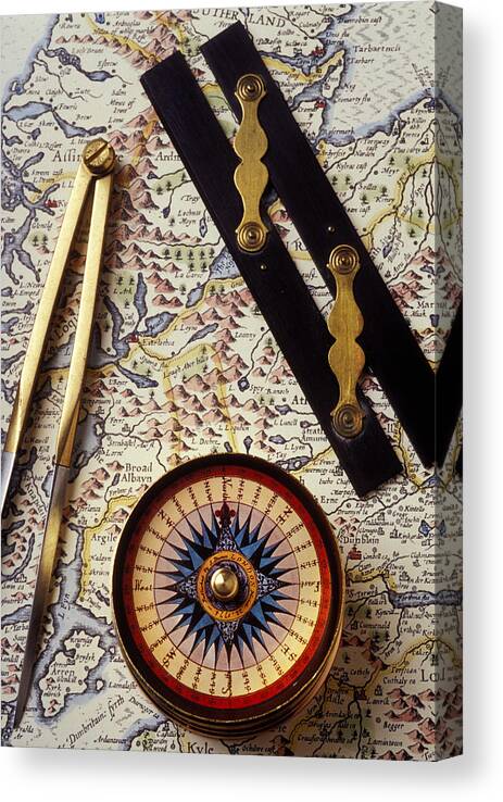 Compass Canvas Print featuring the photograph Map with compass tools by Garry Gay