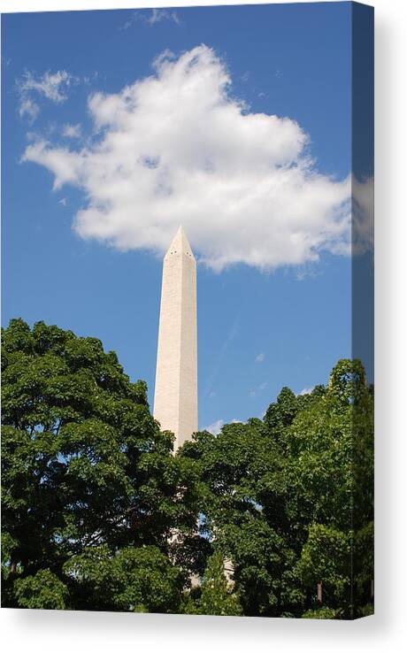 Washington Canvas Print featuring the photograph Obelisk Rises Into the Clouds by Kenny Glover