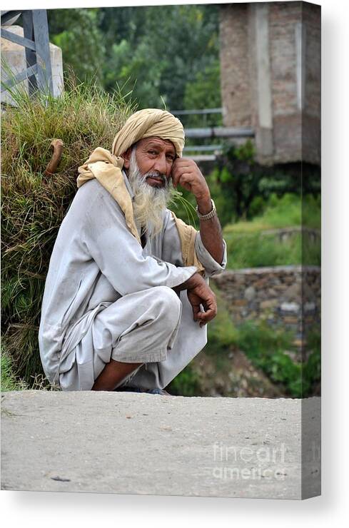 Old Man Canvas Print featuring the photograph Old man carrying fodder Swat Valley KPK Pakistan by Imran Ahmed