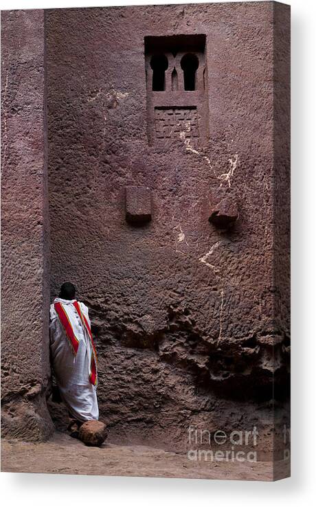 Africa Canvas Print featuring the photograph Priest Praying Outside Church In Lalibela Ethiopia by JM Travel Photography