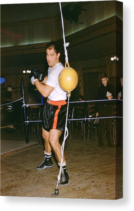 Marvin Newman Canvas Print featuring the photograph Rocky Marciano Training Hard by Retro Images Archive