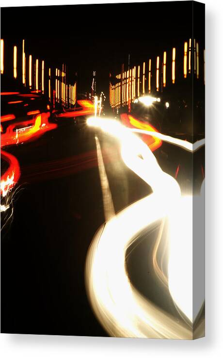 Light Canvas Print featuring the photograph Rushing Traffic by Rajiv Chopra
