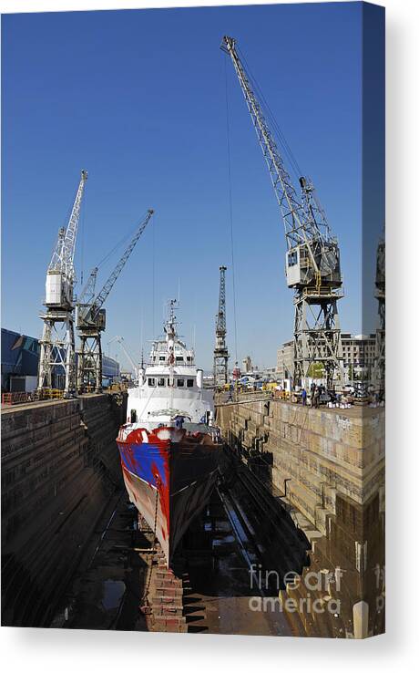 Ship Canvas Print featuring the photograph Ship being repaint in dry dock by Sami Sarkis