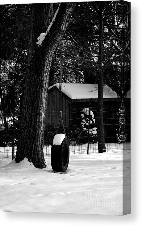 Winter Landscape Canvas Print featuring the photograph Snow on Tire Swing by Frank J Casella