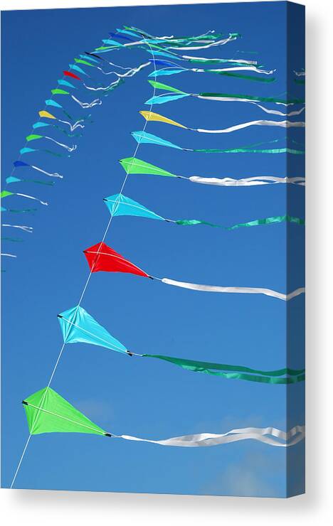 Barmouth Canvas Print featuring the photograph String of Kites by Rob Huntley