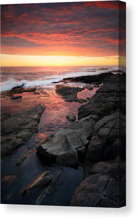 Ocean Canvas Print featuring the photograph Sunset over rocky coastline by Johan Swanepoel