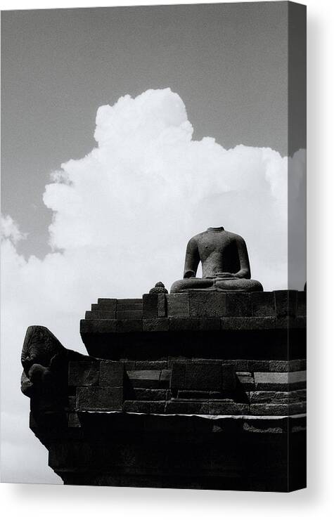 Buddha Canvas Print featuring the photograph Surreal Buddha Of Borobudur by Shaun Higson