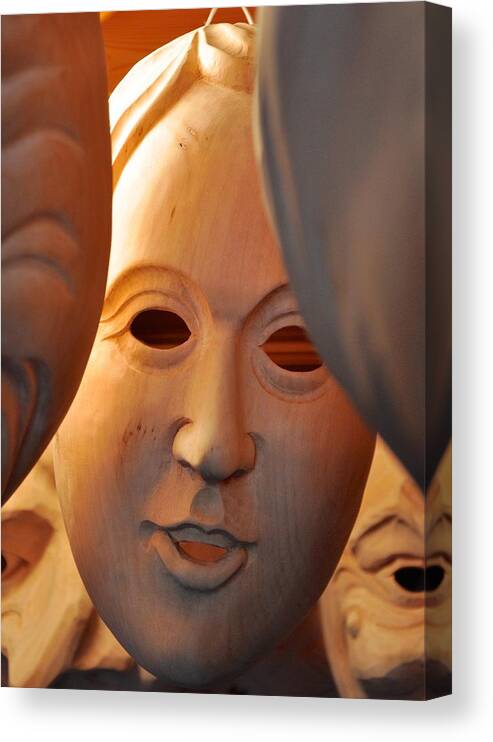 Wood-carved Smile Canvas Print featuring the photograph Wood-carved smile by Matt MacMillan