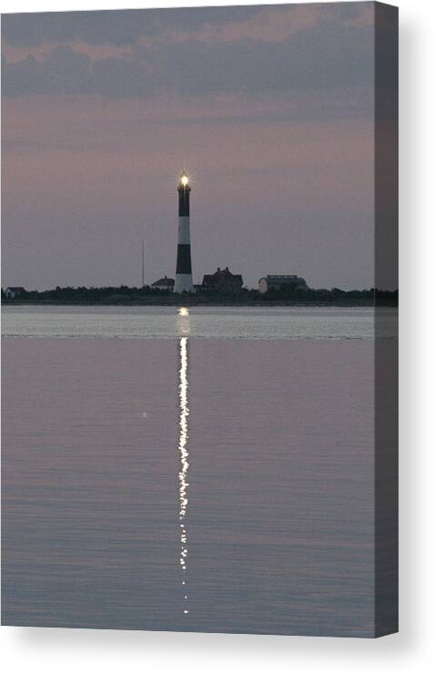 Fire Island Light Canvas Print featuring the photograph Fire Island Flash Very Early Morning by Christopher J Kirby