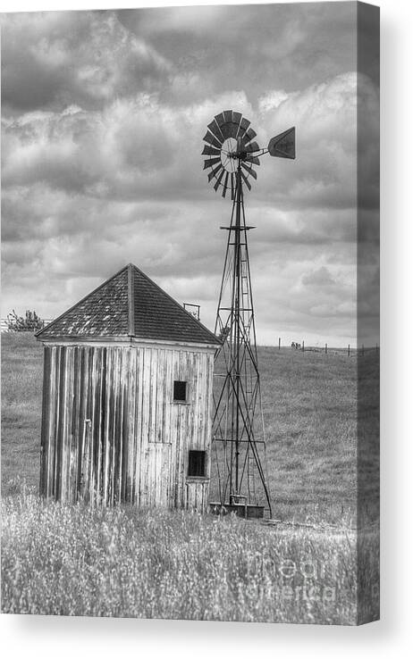 Clouds Canvas Print featuring the photograph Windmill and Shack by Jim And Emily Bush