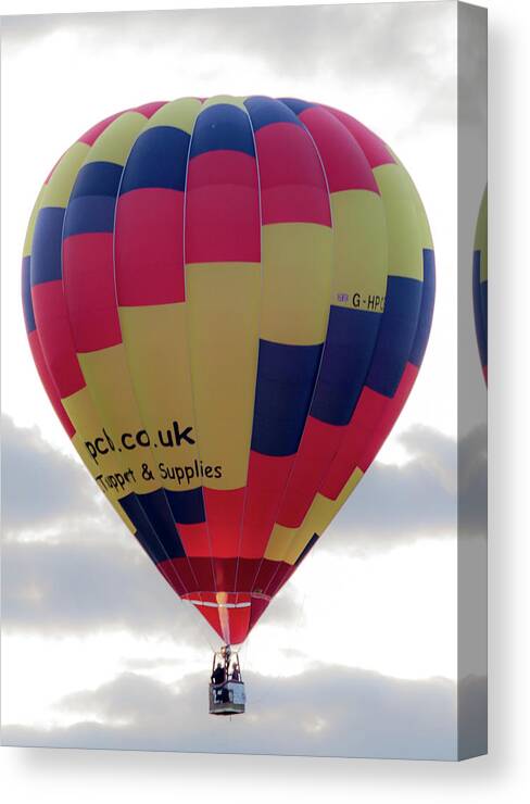 Aerial Canvas Print featuring the photograph Blue, Red and Yellow Hot Air Balloon by Scott Lyons