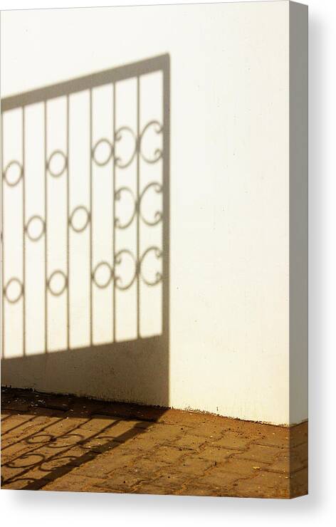 Mysterious Shadow Canvas Print featuring the photograph Gate Shadow by Prakash Ghai