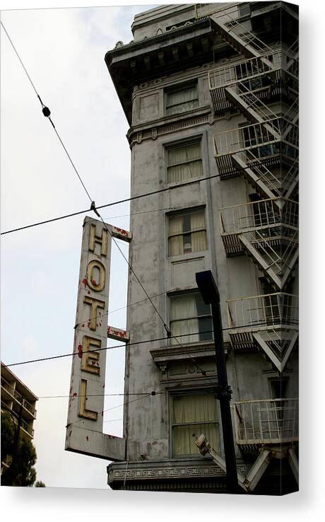 Building Canvas Print featuring the photograph Hotel by Linda Shafer