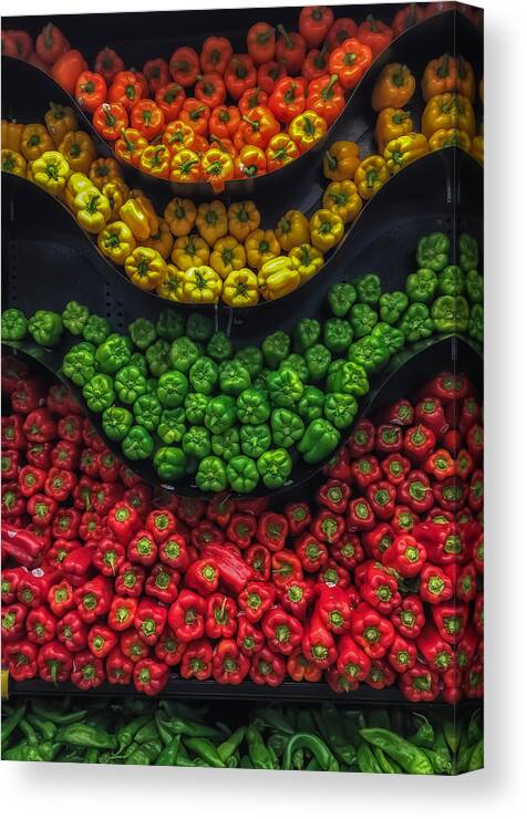 Abstract Canvas Print featuring the photograph Peppers by Jonathan Nguyen