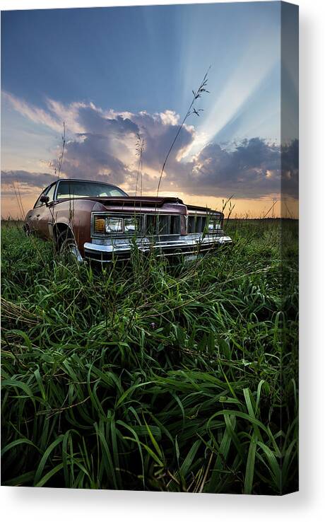 Field Canvas Print featuring the photograph Pontiac sunset by Aaron J Groen