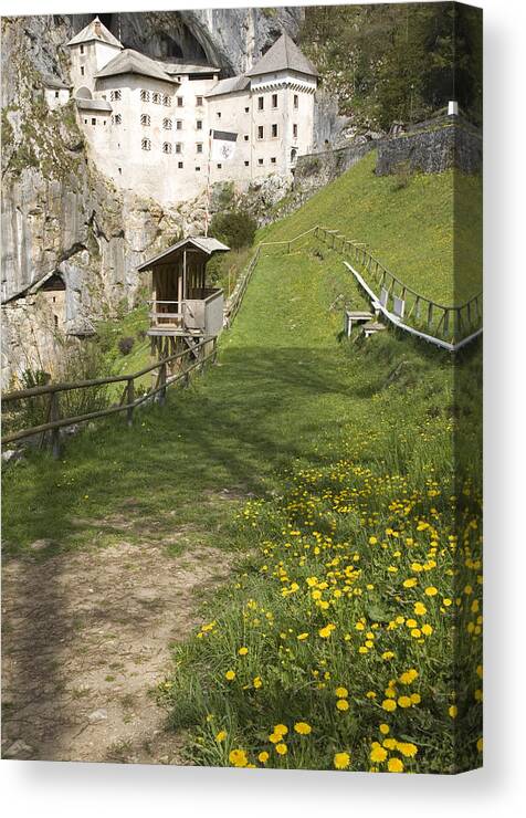 Predjama Canvas Print featuring the photograph Predjama castle by Ian Middleton