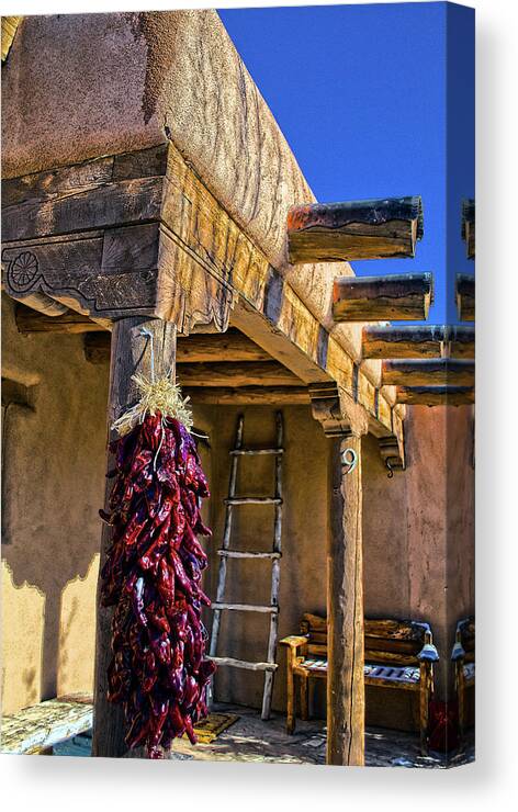 Red Canvas Print featuring the photograph Red Chillies at New Years by Charles Muhle