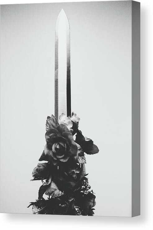 Sword Canvas Print featuring the photograph Sword and Rose by Desmond Manny