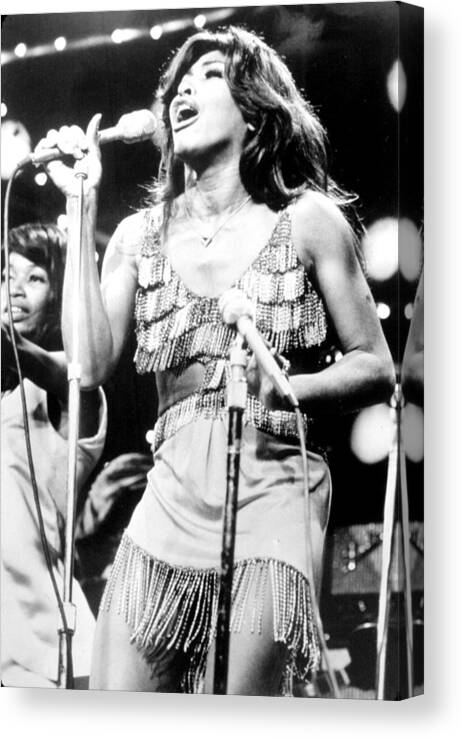 1970s Fashion Canvas Print featuring the photograph Tina Turner, During A Performance by Everett