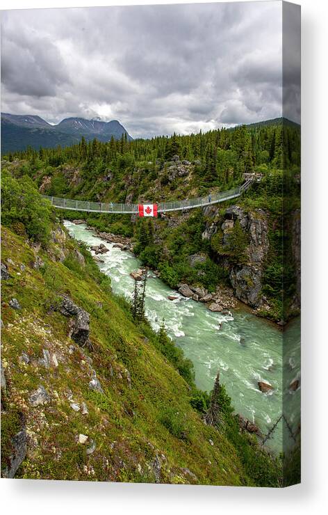 Yukon Suspension Bridge Canvas Print featuring the photograph Yukon Suspension Bridge by Anthony Jones