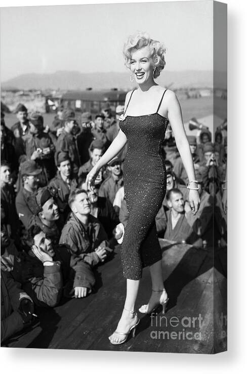 Crowd Of People Canvas Print featuring the photograph Marilyn Monroe Entertaining Troops #1 by Bettmann