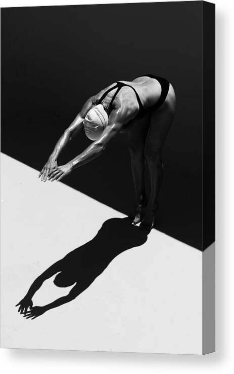 Shadow Canvas Print featuring the photograph A Woman Prepares To Jump Backwards Off #3 by Ben Welsh