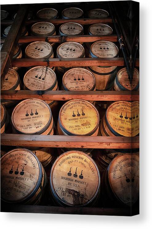 Bourbon Canvas Print featuring the photograph Bourbon Barrels in the Rick by Susan Rissi Tregoning