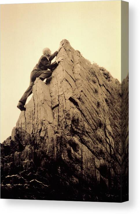 Corporate Business Canvas Print featuring the photograph Businessman Climbing Jagged Rock, Low by Betsie Van Der Meer