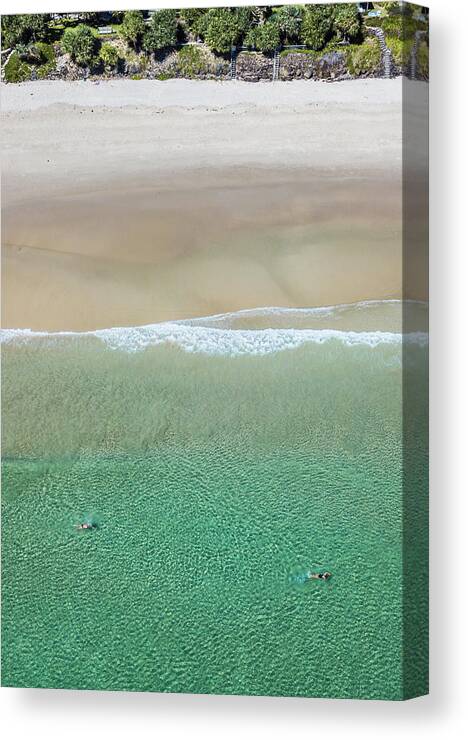 Byron Canvas Print featuring the photograph Byron Bay Swimmers by Chris Cousins