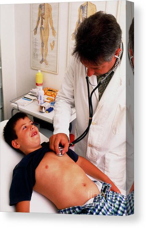 Doctor Canvas Print featuring the photograph Doctor With Stethoscope Examines Young Boy by Mauro Fermariello/science Photo Library