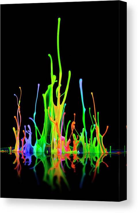 Fluorescent Paint In Motion Canvas Print