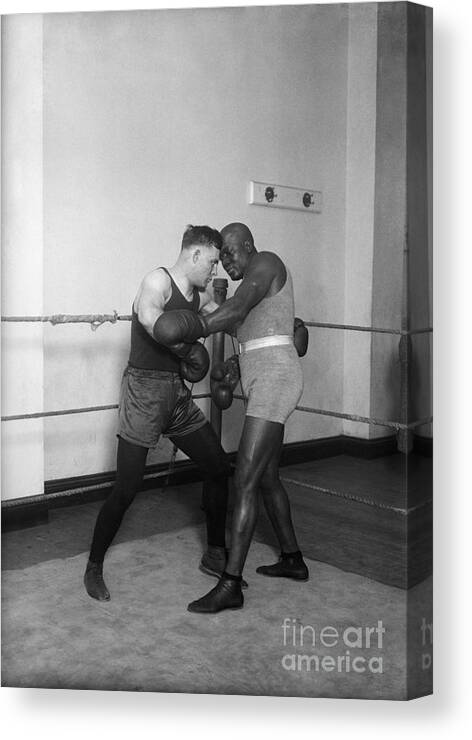 People Canvas Print featuring the photograph Jack Johnson,floyd Patterson Sparring by Bettmann