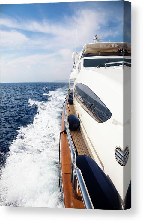 Motorboat Canvas Print featuring the photograph Luxury Yacht Sailing At Sea by Petreplesea