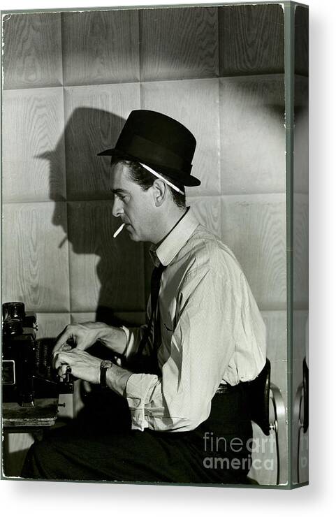 Smoking Canvas Print featuring the photograph Newspaper Reporter At Typewriter by Bettmann