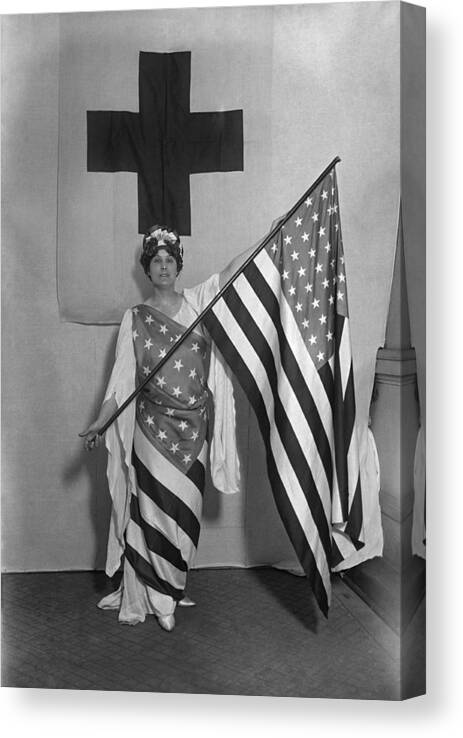 Lady Liberty Canvas Print featuring the photograph Patriotic Woman Wrapped In US Flag - WW1 by War Is Hell Store