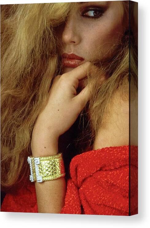 #new2022vogue Canvas Print featuring the photograph Patti Hansen Wearing A Gold Cuff by Stan Malinowski
