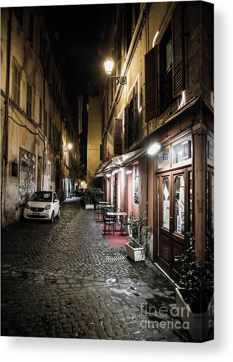 Italy Canvas Print featuring the photograph Pizzeria in Abandoned Street at Night in Rome in Italy by Andreas Berthold