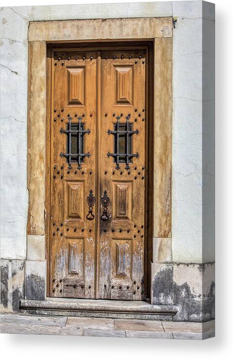 Door Canvas Print featuring the photograph Weathered Brown Door of Portugal by David Letts