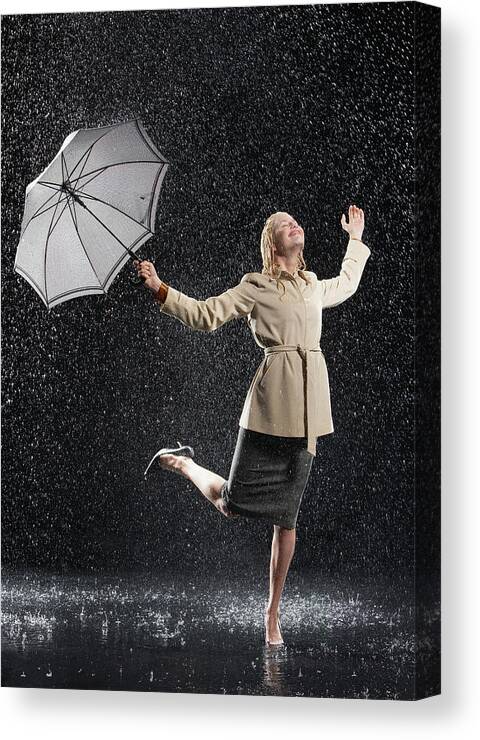 Shower Canvas Print featuring the photograph Woman Enjoying The Rain by Moodboard