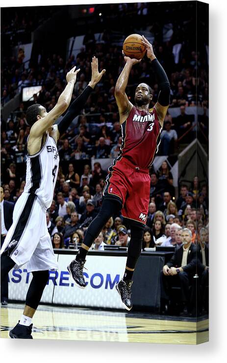 Playoffs Canvas Print featuring the photograph Dwyane Wade and Danny Green #1 by Andy Lyons